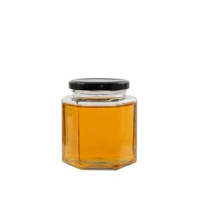 China Bird's Nest Bottles Glass Folding Honey Food Storage Jar With Transparent Metal Lid for sale