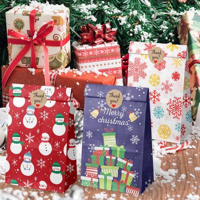 China Creative Kraft Paper Christmas Paper Bag Cardboard Decoration Christmas Gift Packaging Bag for sale