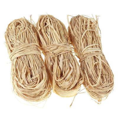 China Convenient Natural Raffia Rope Ribbon Ply Cut Raffia Grass For Bouquets Weaving Gift Wrapping for sale