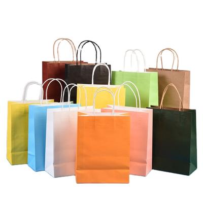 China Custom Wholesale Colored Paper Recyclable Gift Bag Printing Craft Paper Shopping Bag Kraft Paper Brown Takeout Bag for sale