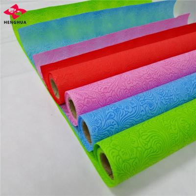 China Custom embossed Henghua flower spunbond nonwoven fabric Anti-pull/stone/wave/bubble pattern polypropylene rolls TNT fabric wholesale for sale