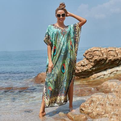 China Anti-Static Summer Plus Size V Neck Ethnic Clothing Indian Beachwear Split Cover Up Peacock Sun Women Casual Outfits for sale