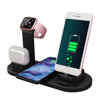 China Hot Selling Mobile Phone 15W Fast Battery Charger 4 in 1 Wireless Charger for Mobile Phone Watch Earphones for sale