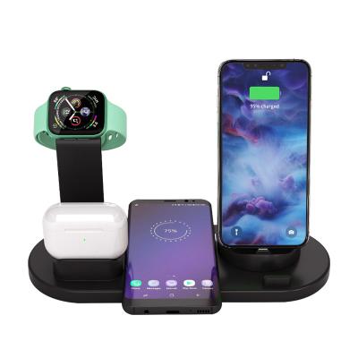 China Hot Selling Mobile Phone Mobile Phone Fast Charger Wireless Charger 4 in 1 15W for Smart Watch Earphones for sale