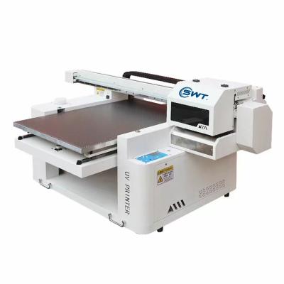 China Hotels 6090 5060 A3 A4 Size UV Printer Inkjet Flat Bed UV Printing Machine for sale