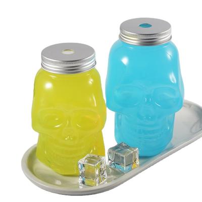 China Transparent Beverage PET Skull Shape Beverage Bottle Squeezer Bottle 10,000pcs Water Bottle Plastic With Wide Mouth 500ml Plastic for sale