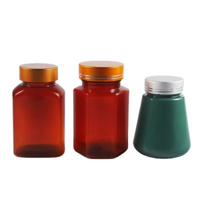 China Wholesale Plastic Medicine Pill Bottles 120cc Amber Capsule Bottles Empty Pharmaceutical PET Medicine Screw Cap Colored Irregular for sale