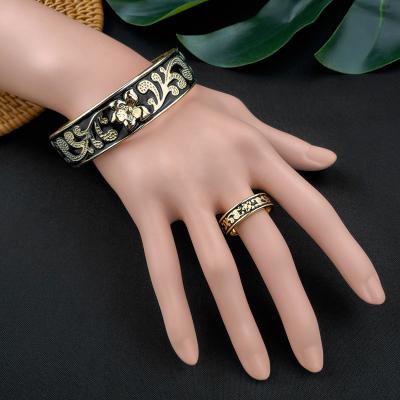 China Island Style Hawaii Flower Black Enamel Gold Plated Bracelet Set Custom Bracelet For Women for sale