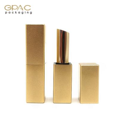 China Empty cosmetics shiny gold lipstick tube, oblique mouth, square magnet lipstick container for sale