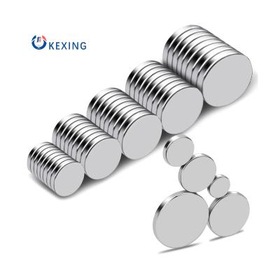 China Industrial Super Strong Round Magnet KEXIN NeFeB N35 N38 N40 N42 N45 N48 N50 N52 Disc Neodymium Magnet for sale