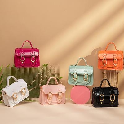 China Wholesale Women Designer Handbags PU Bag Mini Small Jelly Crossbody Bag Rivet Shoulder Bag for sale