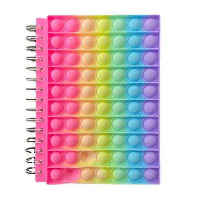 China Soft Cover Silicone Noise Pushing Bumpy Person Bubble Popper Toy Popit Notebook For Child for sale