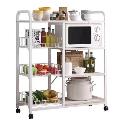 China Sustainable Floor Type Microwave Oven Rack Kitchen Storage Rack Bowl And Dish Multilayer Storage Cabinet for sale