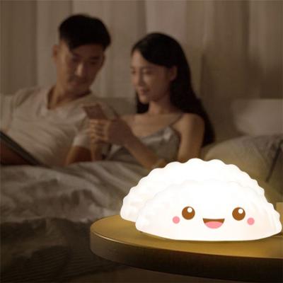 China Modern Creative Gift Dumplings Led Night Light Bedroom Home Bedside Soft Silicone Lamp for sale