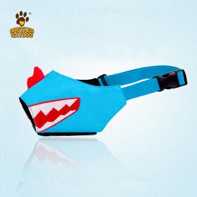 China Cute Breathable Padded Pet Muzzle Best Dog Muzzle For Dog Sharp Smiling Muzzle With Sticking Tongue for sale