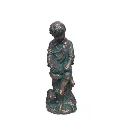 China Custom Europe A Boy Look Books Statue Resin Sculpture Decoration Resin Crafts Home Sculpture for sale