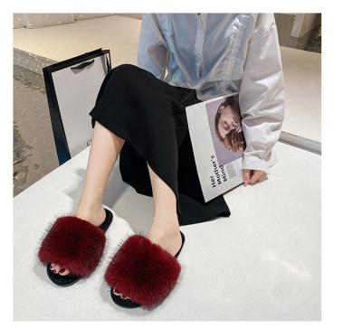 China New Fashion Sweat-absorbent Fluffy Home Slippers Women's Plush Slippers for sale