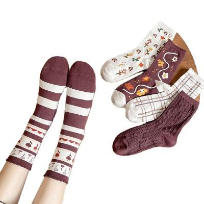 China Autumn and winter coffee retro South Korea door trend east flower socks breathable medium tube socks lace up women's cotton socks for sale