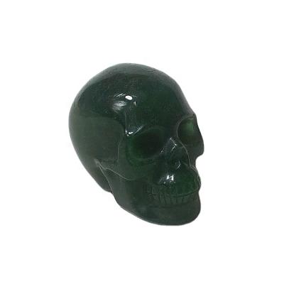 China China Natural Quartz Hand Engraving Reiki Green Strawberry Crystal Skulls For Crystals Healing Stones for sale