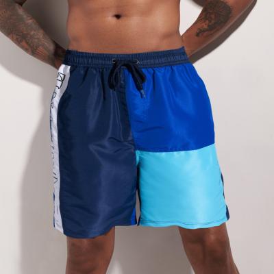 China Sustainable Mesh Shorts Three-color Striped Summer Stitching Bottom Beach Pants Mens Shorts Short Length for sale