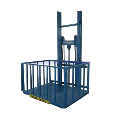 China Hotels 500KG-10 Ton Wall Mounted Hydraulic Lift Fixed Lift For Goods 2 Floor Electric Cargo Lift Warehouse Platform Lift for sale