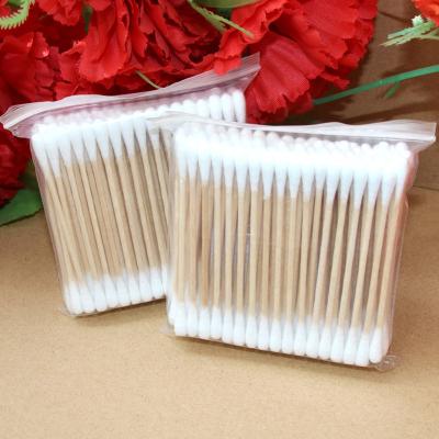 China Eco-Friendly Disposable Colorful Bamboo Medical Wooden Cotton Swab Ear Cleaner for sale