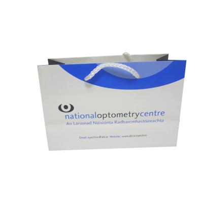 China Disposable Eco Friendly Custom Printed White Paper Bags With Logo for sale