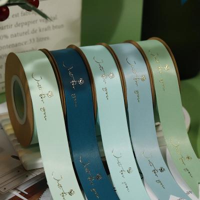 China Customized Goldfolie Druck Polyeater Satin Band für Geschenkverpackung zu verkaufen