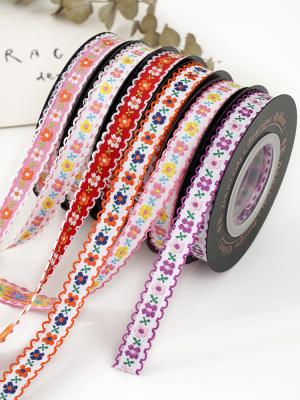 China OEM ODM Flower Jacquard Trim 10mm-25mm Flower Jacquard Ribbon Te koop