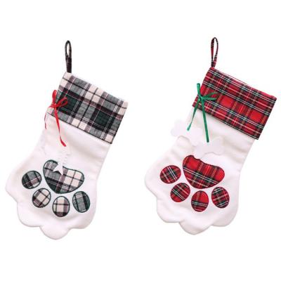 China Cotton/Polyester Christmas Decorations Baby Candy Bags Kids Hanging Socks Paw Design Gifts Bag Kids Party Supplies Christmas Stockings for sale