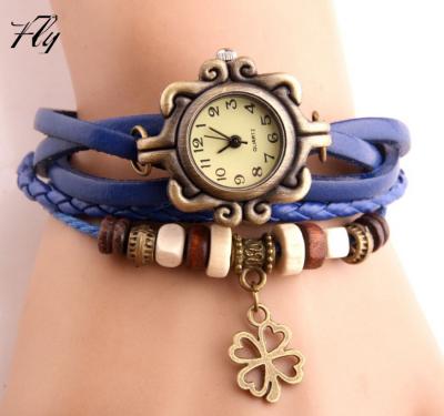 China Lucky Clover Charm Bracelet Woman Genuine Leather Watch Genuine Leather Strap for sale