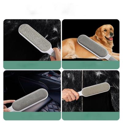 China Pet Viable Hair Remove Scratch Brush Hair Cleaning Brush For Dogs/Cats With Self Clean Base for sale