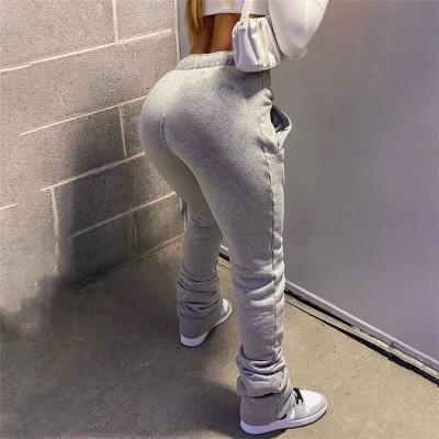 China Breathable Autumn Solid Color Elastic High Waist Pleated Drawstring Plus Size Pants Women Sweatpants Stacked Pants for sale