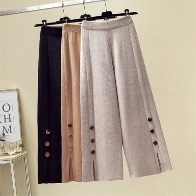 China Solid Color Breathable Spring Hot Buttons Split Elastic Waist Knit Pants Womens Wide Leg Knitted Pants for sale