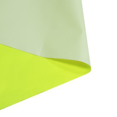 China Fluorescent Yellow White Waterproof Twill 75D*150D Waterproof Pongee Moisture-Permeable Fabric for sale