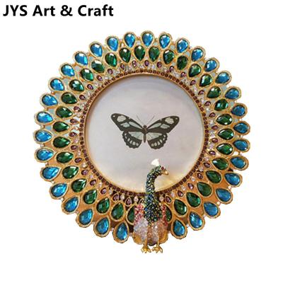 China Luxury Peacock Shape Picture Frame Home Decoration Resrhinestone Photo Frame 10x15 Metal Frame for sale