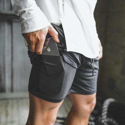 China Men's Clothing Anti-UV Sportswear Capris Pants Gym Training And Wear Jogging Two Piece Shorts for sale