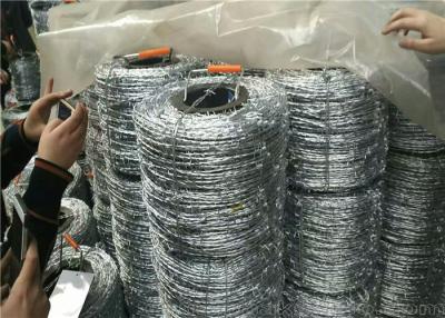 China itary 50kg Concertina Razor Barbed Wire 20g Zinc Coated for sale