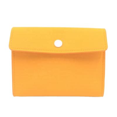 China Fashion BSCI ISO Sedex FAMA Customizable Yellow Leather Travel Cosmetic Bag Organizer With Snap Closure for sale