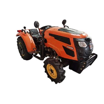 China Hotels Agriculture Hand Walking Tractor Four Wheel Mini Garden Tractor Mini Tractor à venda