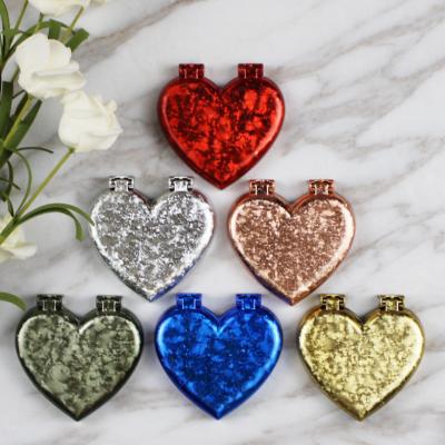 China Universal Phone Holder Heart Shape Craft Pocket Plated Double Sided Mirror Strap Mobile Phone Back Bracket for sale