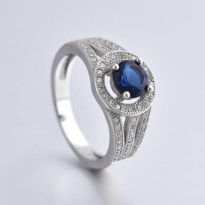 China 925 Sterling Silver Jewelry 925 Sterling Silver Halo Ring With Blue Stone for sale