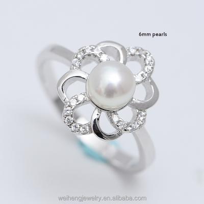 China Rhodium plated china jewelry factory supply 925 sterling silver flower shape pearl moti ring design for women for sale