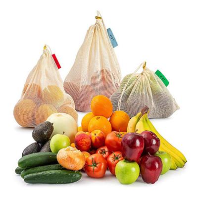 China 100% Eco-Friendly Recycle Shopping Mesh Drawstring Bag Boho Food Storage Meshed Bags For Fruits And Vegetables for sale