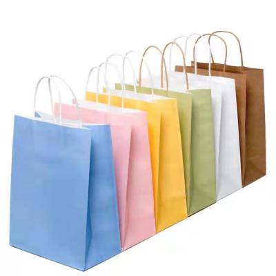 China 100% Wholesale Printed Custom Paper Bags Eco-friendly Gift Packaging Bag With Your Own Logo With Rope Handle for sale