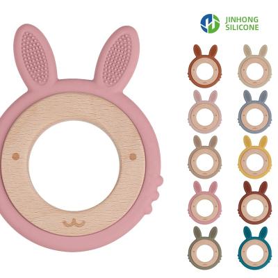 China Wholesale Soft Toy 2022 Bpa Free Food Grade Rainbow Color Bunny Toys Baby Silicone Wooden Teether for sale