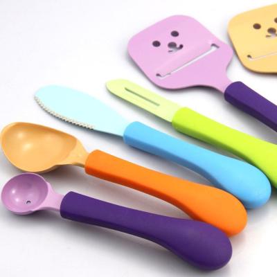 China Kitchen 5pcs Viable Creative Kitchen Utensils Multifunctional Set Ice Cream Scoop Cheese Knife Cutter Knife Fruit Peeler for sale