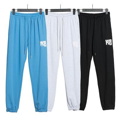 China Anti-wrinkle bulk knit fleece 3d puff print sweatpants high waist elastic ankle jogger sweatpants letter puff printing men's trousers and slacks for sale