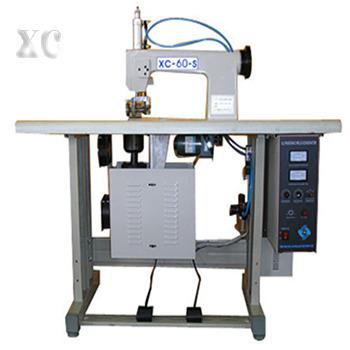 China 2021 New Products Ultrasonic Lace Sewing Machine Roll Rotary Welder For Nonwovens Fabric XC Hotels for sale