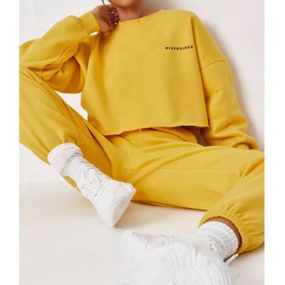 China Wholesale Custom Women QUICK DRY Yellow Crop Tops And Sweatpants Tracksuit for sale